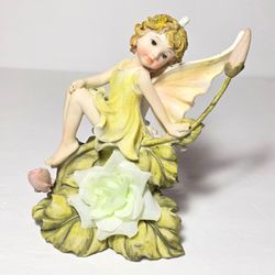 Fairy Figurine With Flowers
