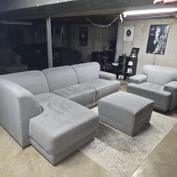 2 piece Gray Sectional and Oversized Chair with Ottoman