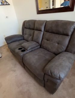 Reclining couch with charging port