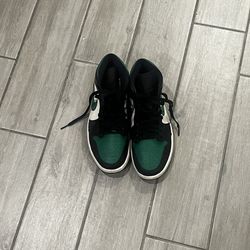 Green black and white Jordan 1’s