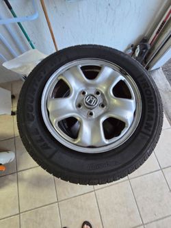 Honda Rims with tire. 215/70/16.