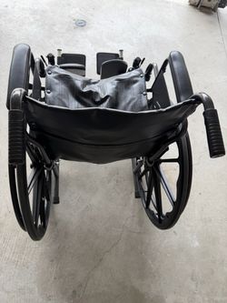 Black Folding Wheelchair with Footrests