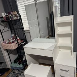 Vanity with sliding mirror 