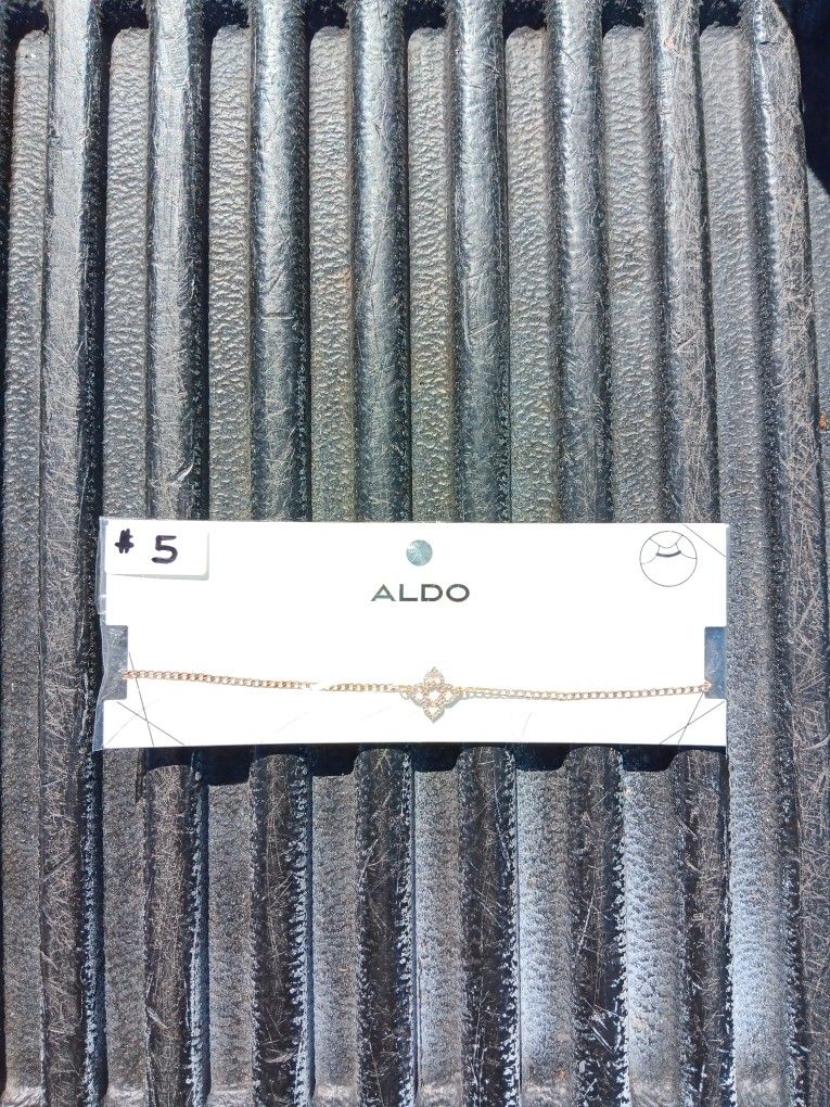 Aldo- gold tone choker necklace 