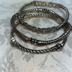 Set of 3 stretchy silver tone bracelets 