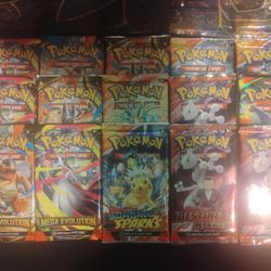 15 original sealed pokemon packs for 120 OBO