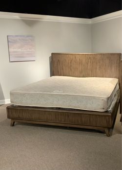 New Queen size brown color panel bed. Not selling mattress