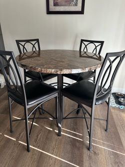 4 chair counter high dining table