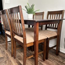 DINING ROOM SET. WOODEN WITH GLASS ON TOP.  “JUST $80”