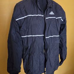 Vintage Adidas full-zip windbreaker jacket in black with white stripes