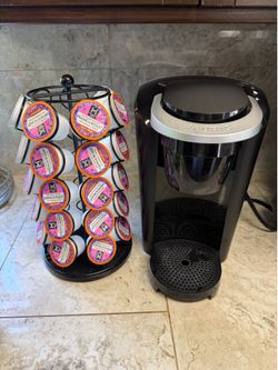 Keurig coffee machine with a pods stand