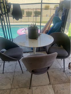 Small dining table and chairs