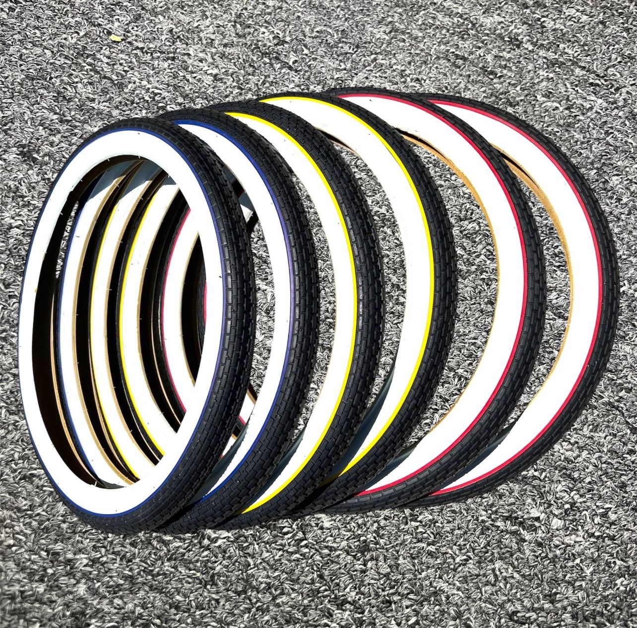 Duro 26 x 2.125 Black/White Side Wall Yellow, Red, Blue, Wall