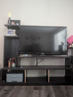 Moving Sale – TV + Large Black Entertainment Center