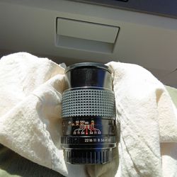 2 photo lenses for sale: 1. Vintage 135 mm f/2.8 manual focus lens. 2. Vintage auto zoom camera lens.