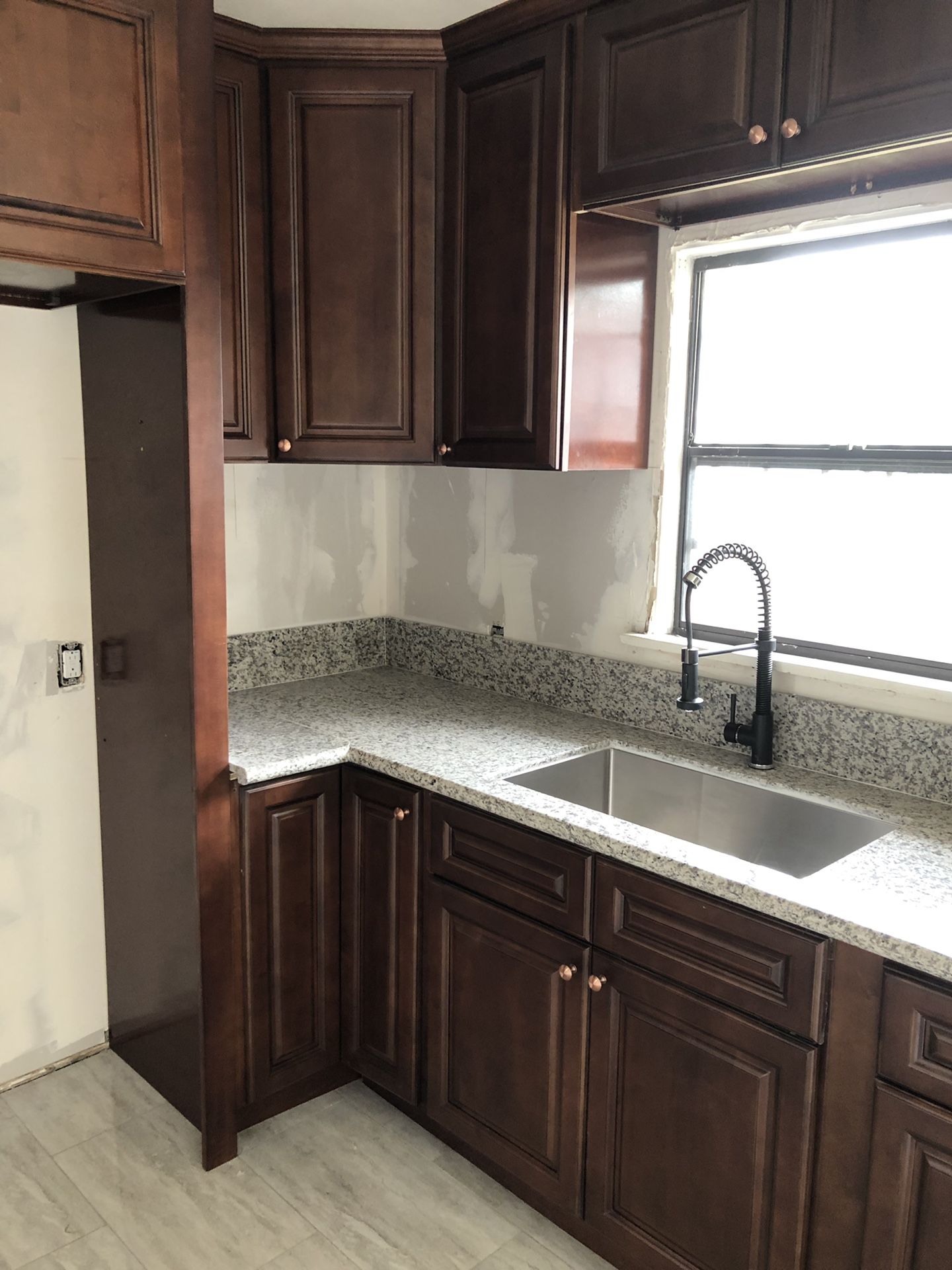Cabinets, granite and quartz