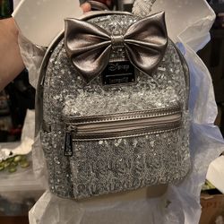 DISNEY SILVER SEQUIN LOUNGEFLY 