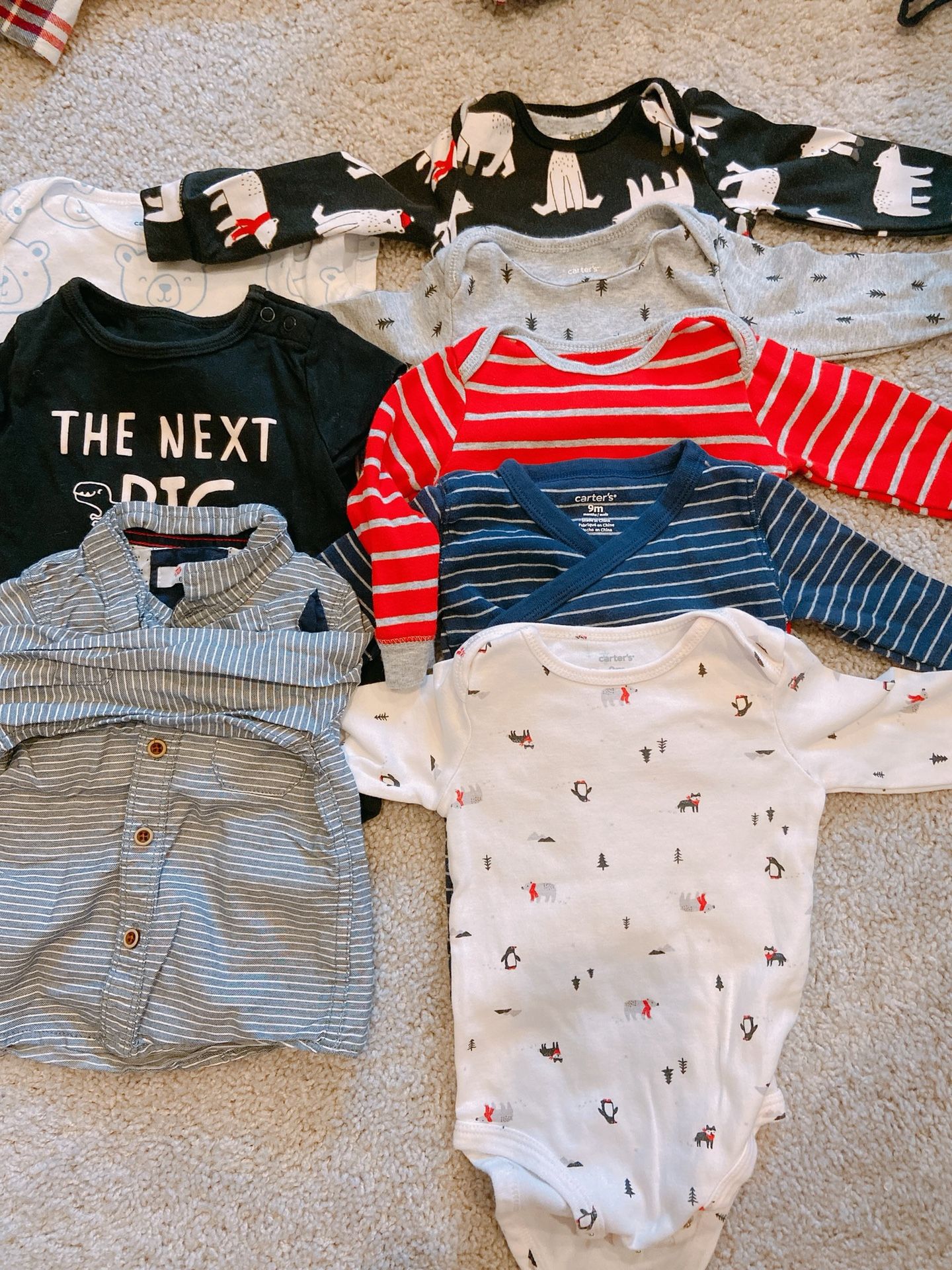 6-9 month, 5 long sleeve onesies, 2 short sleeve onesies and one shirt