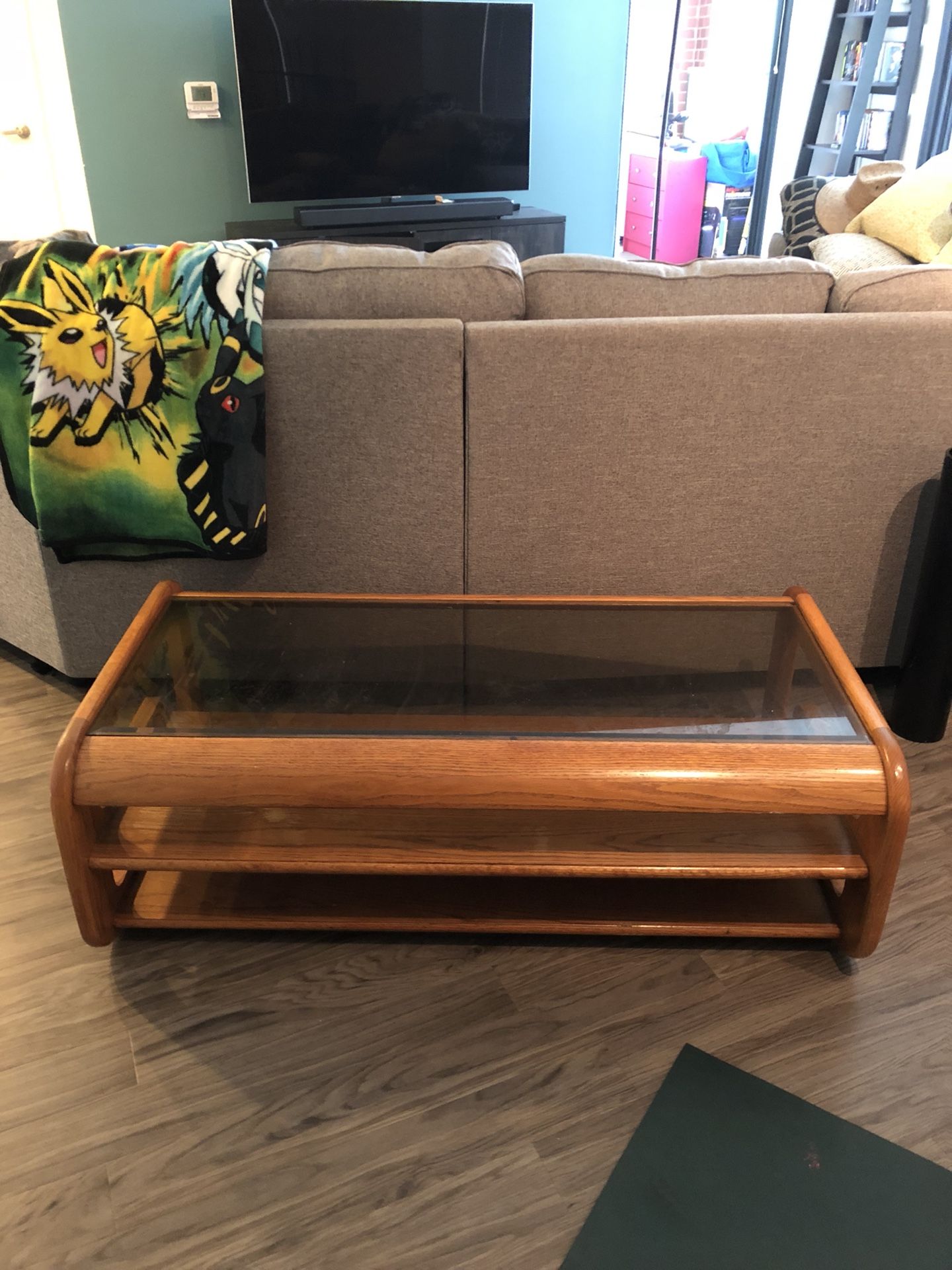 Wooden coffee table, tempered glass top