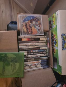 A bunch of video games any some skylanders