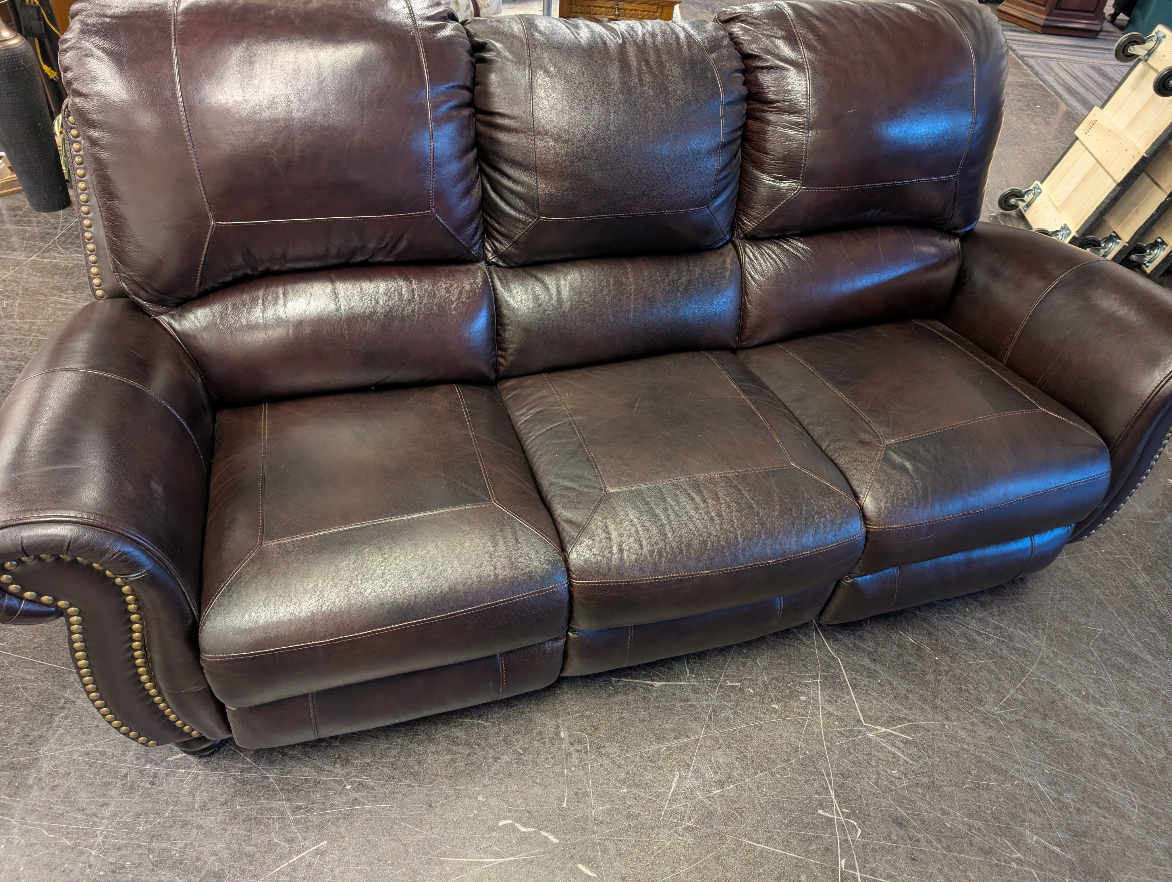 Dark Brown Three-Seat Reclining Sofa with Nailhead Trim