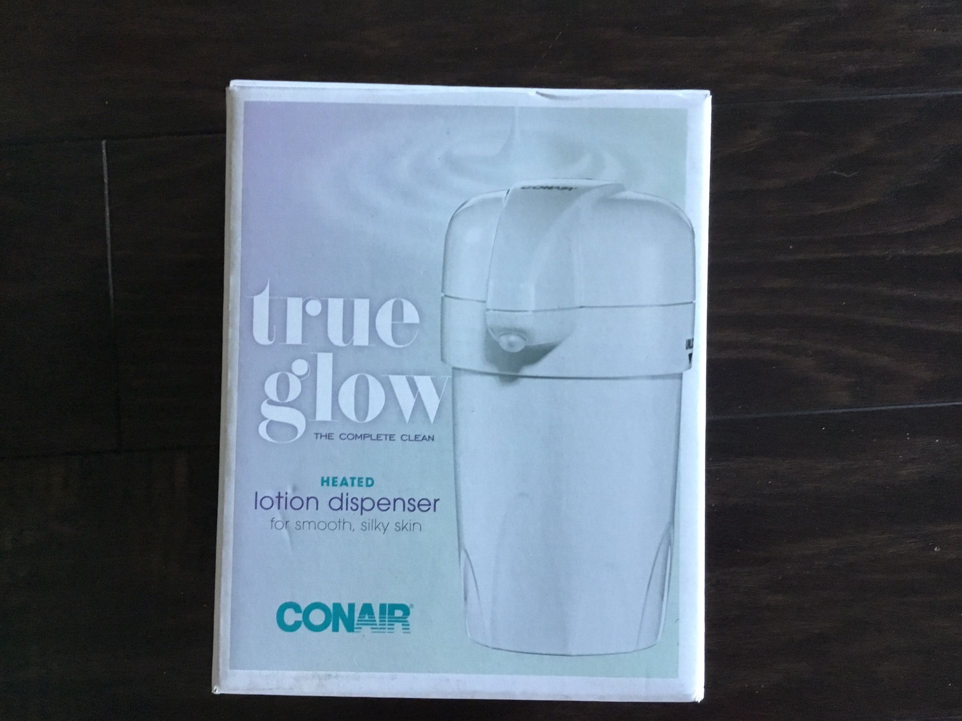 Conair True glow heated lotion Dispenser.  NEW