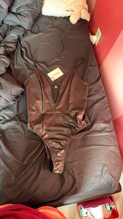 New leather bodysuit large women’s