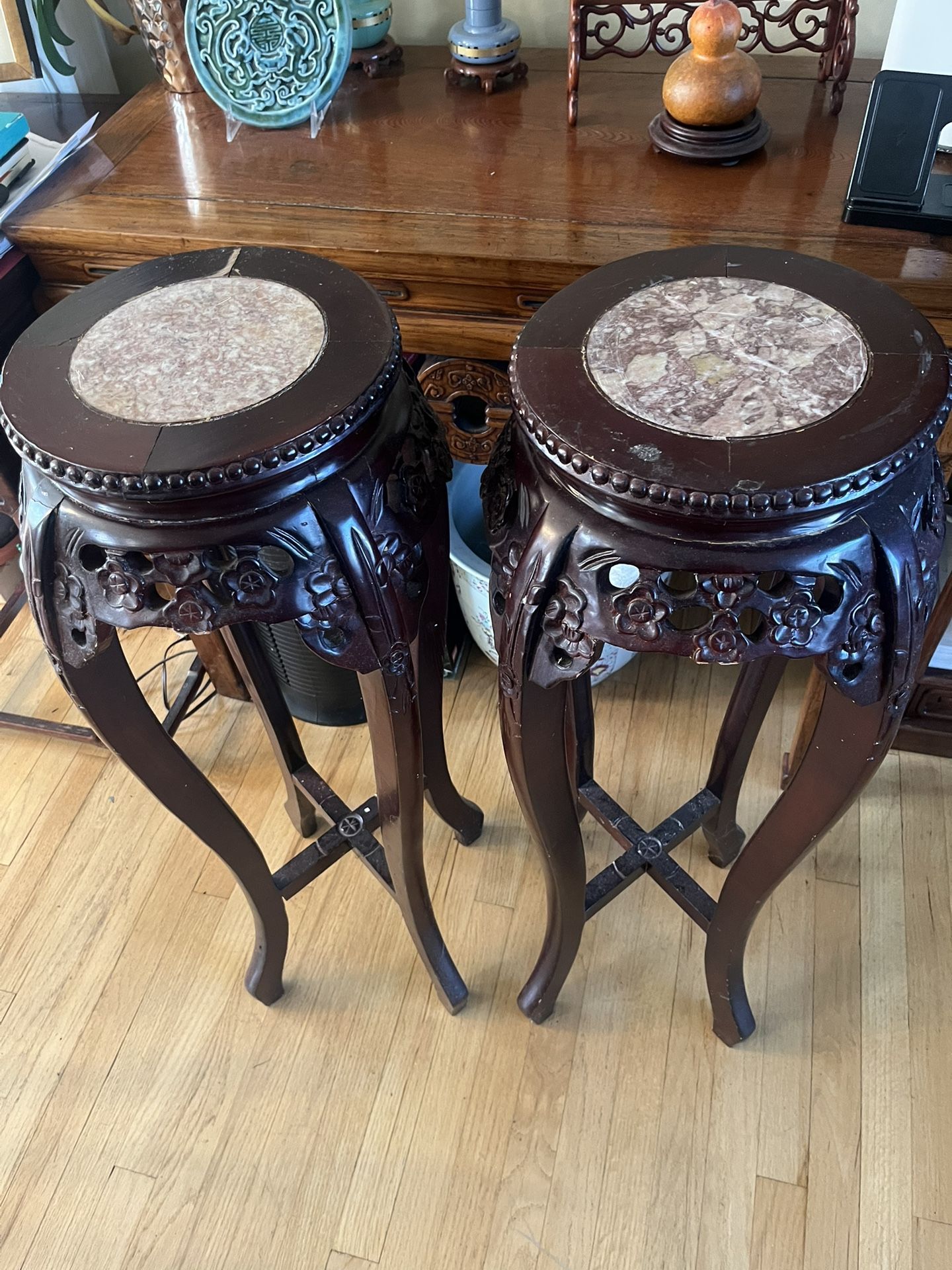 A pair of flower pot stands