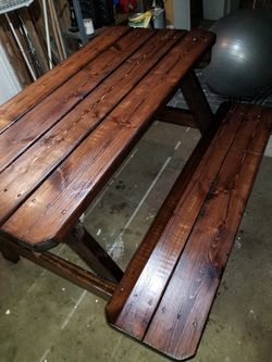 Wooden table stained and clear coated