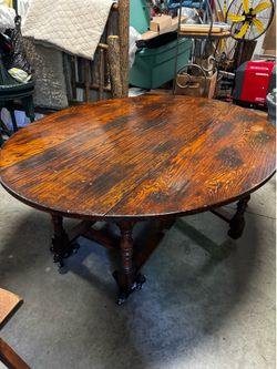 Oval shaped drop leaf coffee table