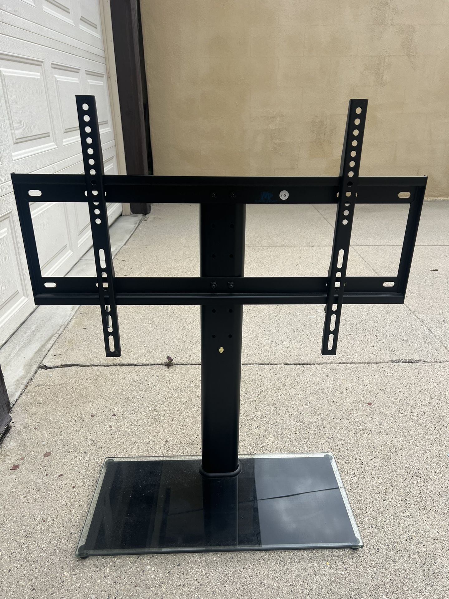 Tv stand with glass bottom