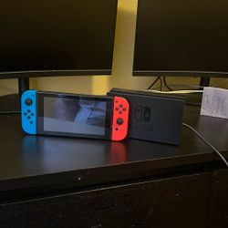 nintendo switch holder and switch