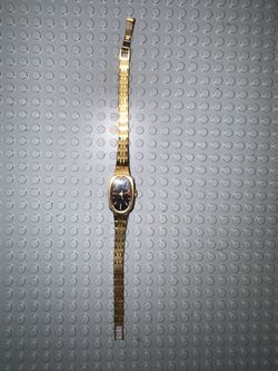 Vintage Timex Quartz Watch Oval Black Dial Gold-Tone Case Untested