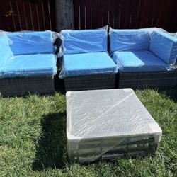 6 Piece Set - NEW IN BOXES - 3 Chair Pieces w/ Cushions + Table + Large Ottomans w/ Cushions