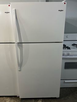 Newer Model Whirlpool White Top Freezer Refrigerator with ice Maker 18 cubic feet