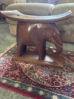 Carved elephant seat