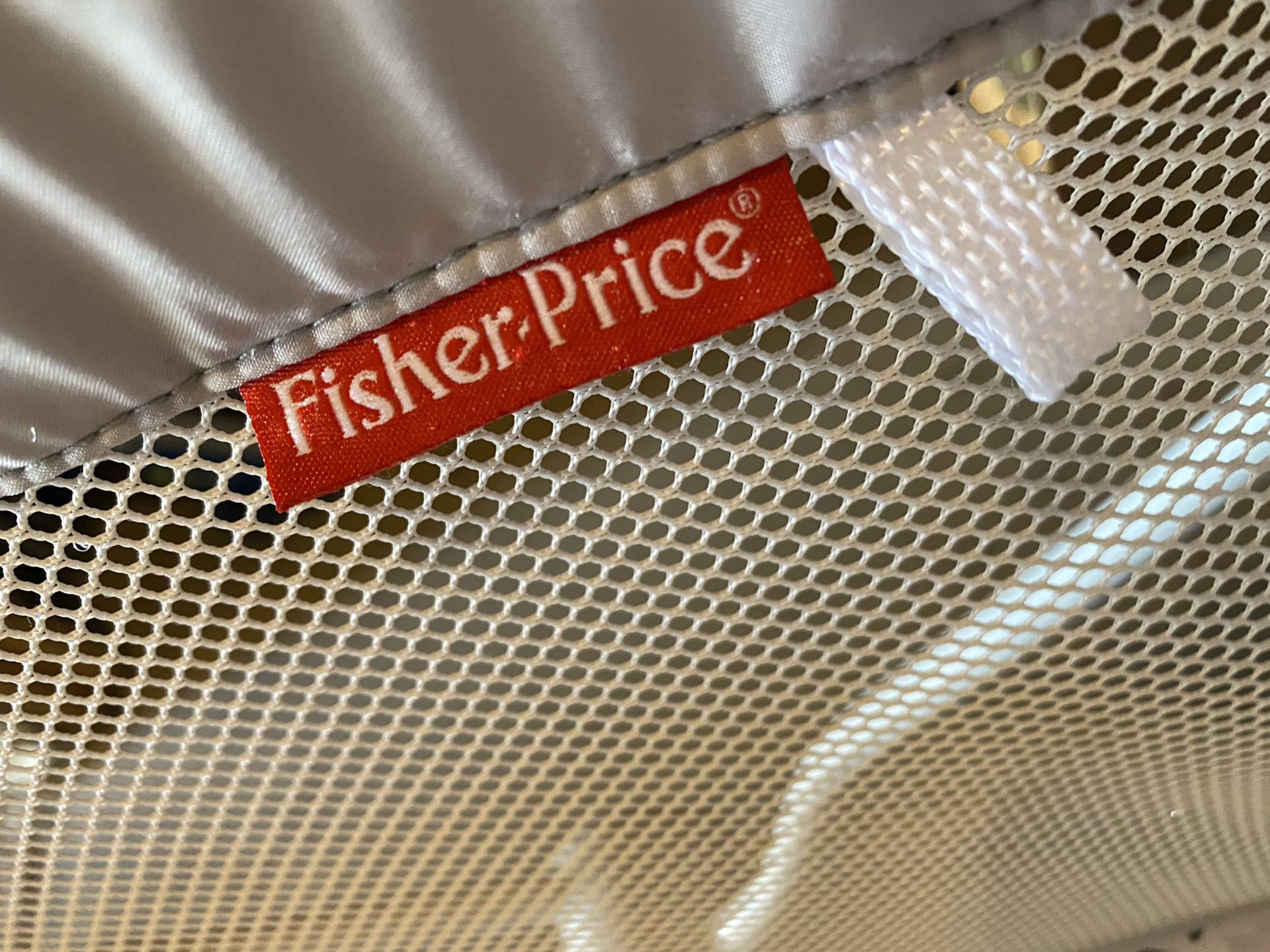 Portable fisher price bassinet