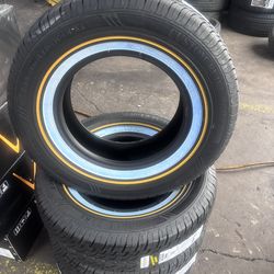 235/70/15 Vogue tire gold