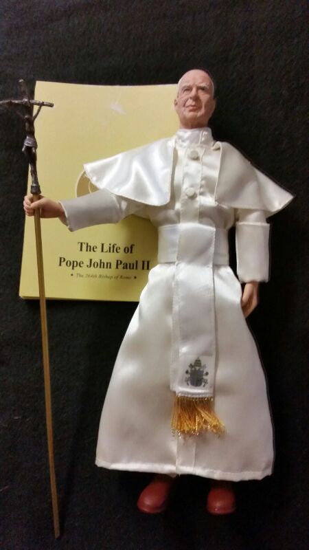 New, Pope doll.
