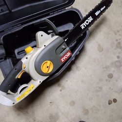 RYOIB. 18 INCH ELECTRIC.  CHAINSAW. NEW.  NEVER USED.    4.5. HP. MOTOR. VERY STRONG. CUTTING   SAW