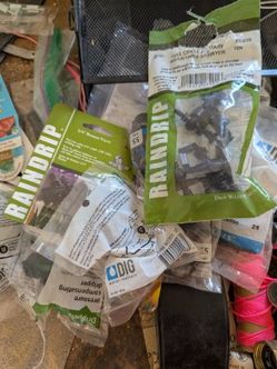 Drip irrigation parts lot: fittings, emitters, valves, tubing