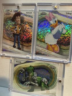 2025 Topps chrome Pixar and Disney cards Woody, Daisy, duck and Rex
