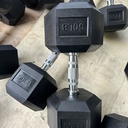 New pair of 50lb rubber dumbbell in box $100            