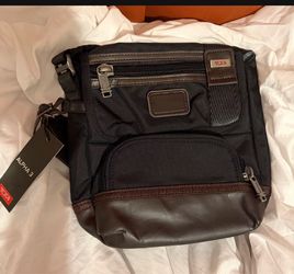 TUMI satchel. New