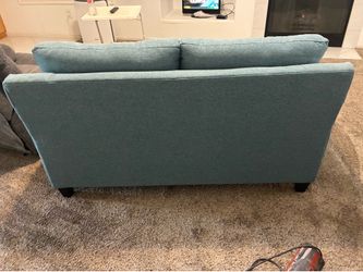 Bluish loveseat, andmetal frame extra long, twin Dormeo mattress on top