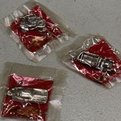 Lot of 3 Vintage Balfour Silver Tone charms, includes Stingray Corvette, Stagecoach, & pickup truck. Approximately 1” long. Pictures of the open packa