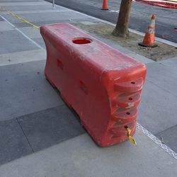 14 orange water barriers