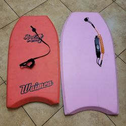 1 local motion waimea boogie board 19 inches , and 1 pink unbranded 39 inch board