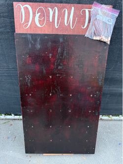 Wood donut wall with pegs and stand