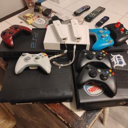 Two PlayStation 2 A Wii And Xbox And Playstation 3